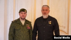 Алаудинов Апти а, Делимханов Адам а
