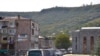 Buses carrying refugees from Nagorno-Karabakh arrive at Vienna Park in Goris