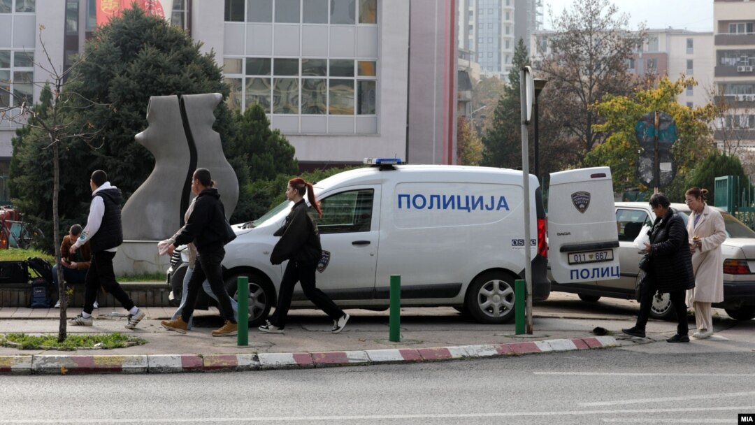 Police help evacuate a high school in Skopje due to a bomb threat, one of many that have plagued North Macedonia in recent months. (file photo)