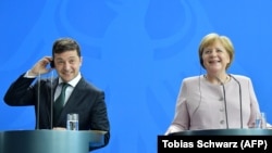 Канцлер Німеччини Анґела Меркель (п) і президент України Володимир Зеленський, архівне фото