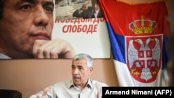 Oliver Ivanović (na fotografiji, maj 2017.) je ubijen 16. januara 2018. godine sa šest hitaca u leđa, ispred svojih stranačkih prostorija u Severnoj Mitrovici na severu Kosova.