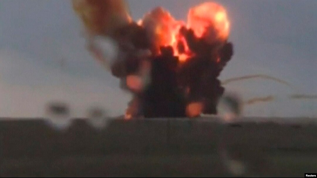 An unmanned Russian Proton-M booster rocket crashes after veering off course after lift-off, in Baikonur, Kazakhstan, on July 2, 2013.