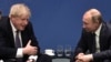 Britaniyanın keçmiş baş naziri Boris Conson (solda) və Rusiya prezidenti Vladimir Putin Berlində keçirilən Liviya konfransında. 1 yanvar 2020 ci il