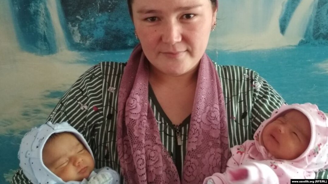 Farida Ghozieva with her newborn twin girls. She believes she also gave birth to a third child. 