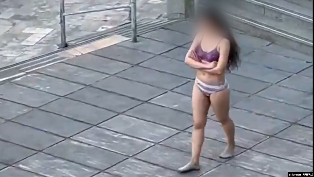 Videos emerged on social media on November 2 showing a young woman stripped to her underwear and walking around outside a university in Tehran.
