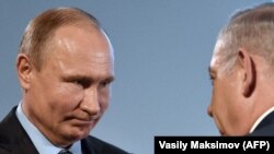 Президент Росії Володимир Путін (л) і прем’єр-міністр Ізраїлю Біньямін Нетаньягу, ілюстративне фото