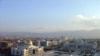 Turkmenistan -- The Presidential Palace (L) in Ashgabat, Mar2007