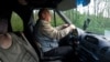 Oleksandr, a volunteer driver, travels to the Ukrainian village of Horsk near the Russian border to collect locals. He ferries people to larger towns so they can access health services and shops.