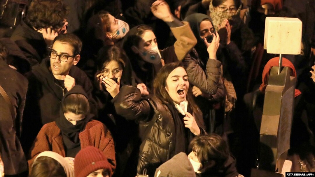 Iranian students chant slogans as they demonstrate following a tribute for the victims of Ukrainian airliner that was shot down over Tehran ion January 8. 