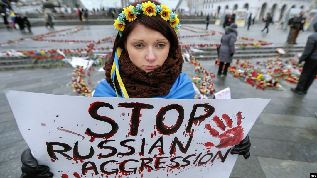 Під час акції вшанування загиблих внаслідок обстрілу Маріуполя реактивними системами залпового вогню з боку російських гібридних сил. Київ, 25 січня 2015 року