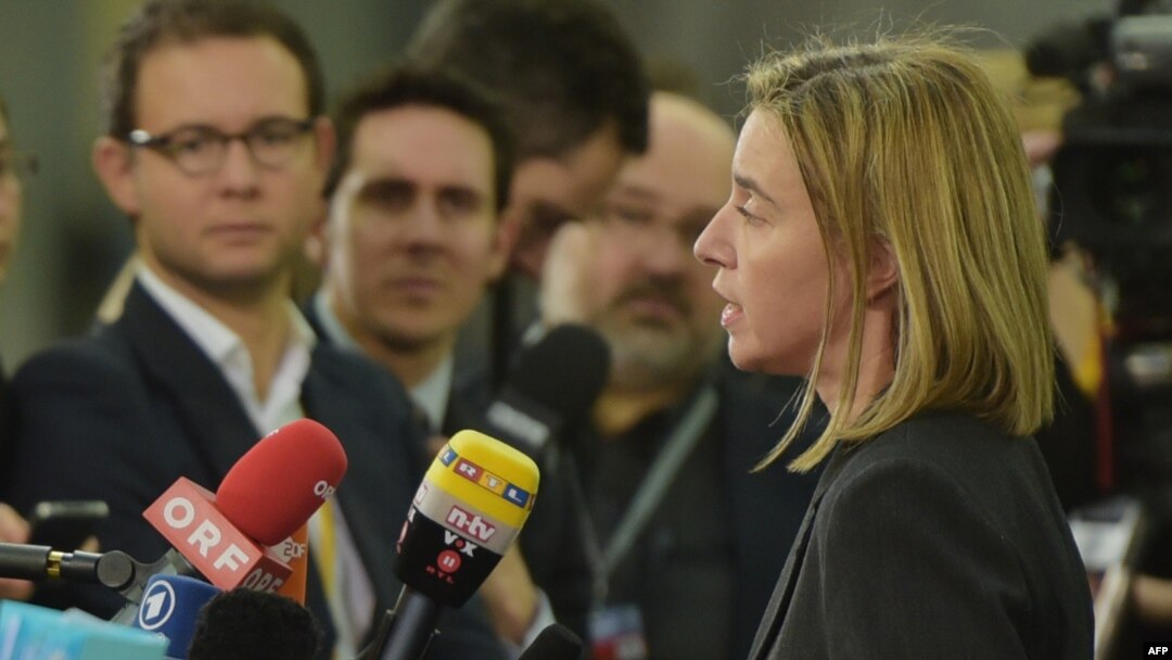 EU foreign policy chief Federica Mogherini talks to journalists prior to the foreign ministers' meeting in Riga.