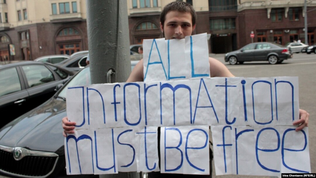 A protester demonstrates against censorship of the Internet near the State Duma in Moscow.