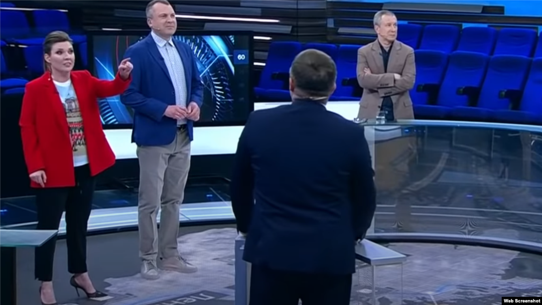 Ольга Скабеєва та Євген Попов. Кадр із ток-шоу телеканалу «Россия-1» «60 минут» 