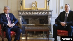 Switzerland -- Armenian President Serzh Sarkisian (L) and his Azerbaijani counterpart Ilham Aliyev meet for talks on the Nagorno-Karabakh conflict at the invitation of Swiss Foreign Minister Didier Burkhalter in Bern, December 19, 2015