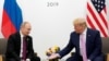 Владимир Путин и Дональд Трамп на встрече в кулуарах саммита "группы двадцати" в Японии (2019)