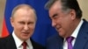 Президент Таджикистана Эмомали Рахмон (справа) и президент России Владимир Путин. Бишкек, 14 апреля 2017 года.