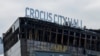 Теракт у «Крокус Сіті»: Слідком РФ каже, що виявив у підозрюваного фото із прапором України