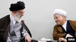 اکبر هاشمی رفسنجانی (راست) همراه با آیت الله علی خامنه ای