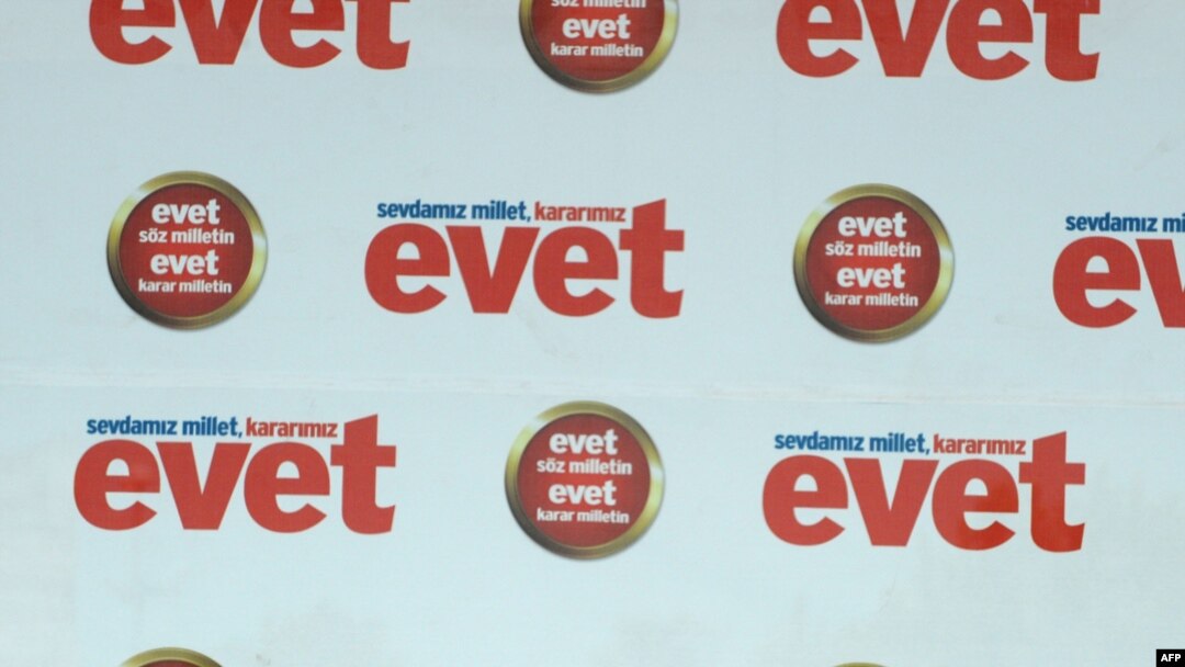 Prime Minister Recep Tayyip Erdogan implores voters at a "yes" ("evet") rally in Istanbul on September 5, one week ahead of the referendum.