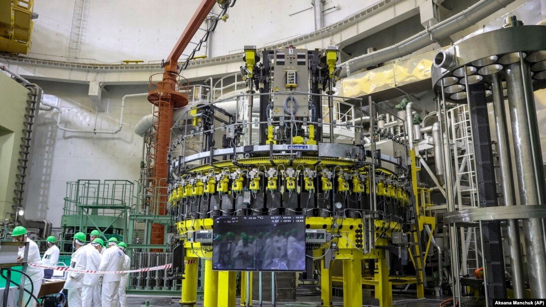 Personnel work to begin loading nuclear fuel at Belarus's first nuclear plant near Astravets on August 7.
